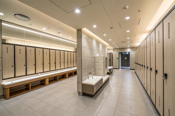 Locker room with benches and neatly arranged lockers