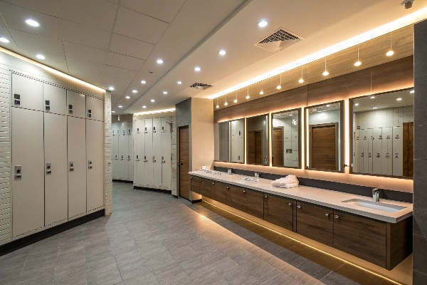 Locker room with lockers and vanity area